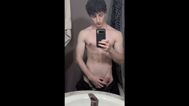 Young Guy Jerks Off in Front of Mirror