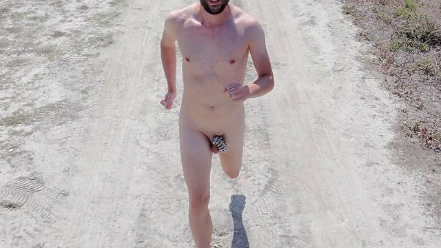 Naked Twink Runs in Chastity Cage