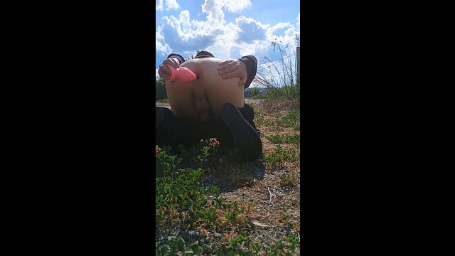 Public Anal Gaping with Pink Buttplug Insertion
