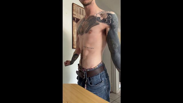 Hairy Tattooed Guy Strokes His Cock