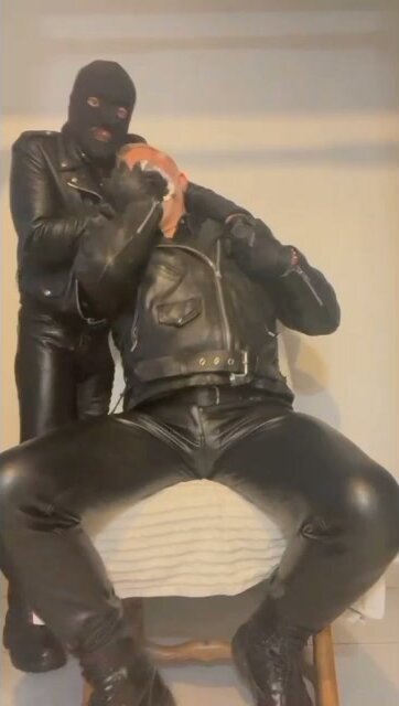 Leather Dom Traps Submissive Bottom