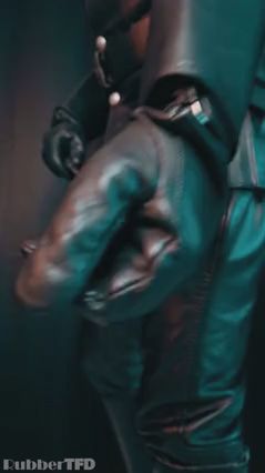 Leather Masked Top Dominates Submissive Bottom