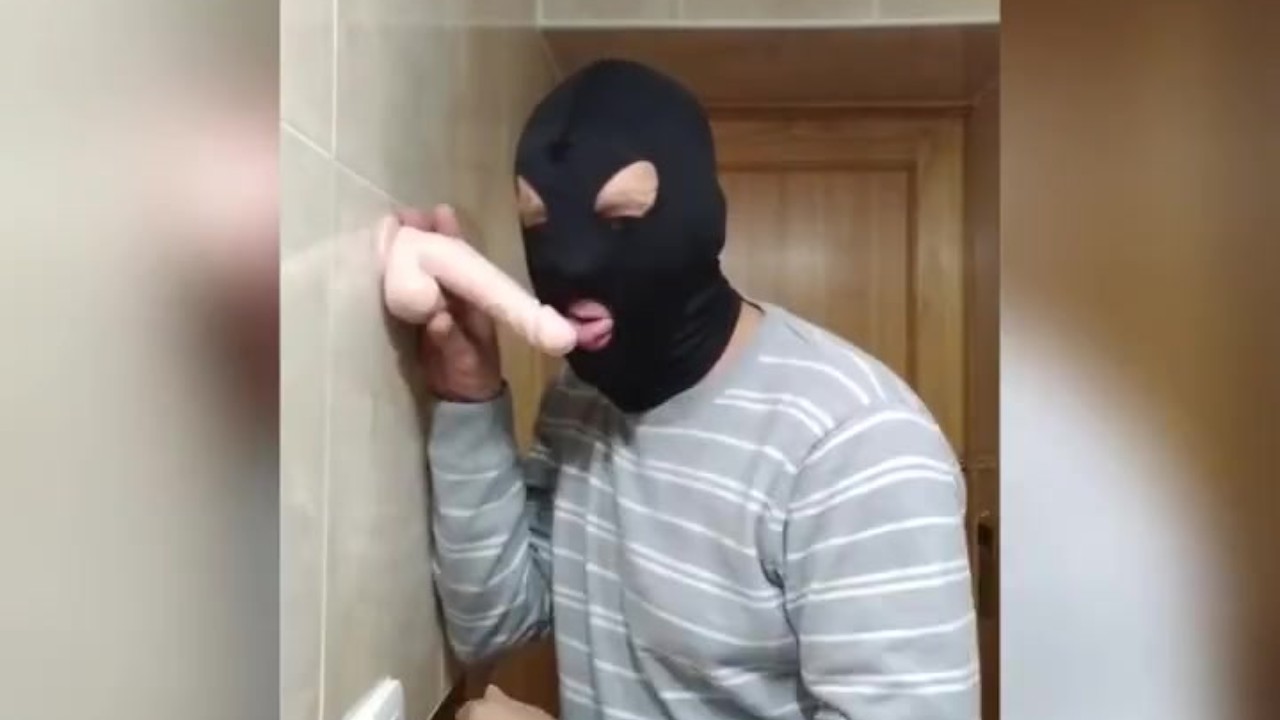 Bisexual Man Engages in Oral Sex with Toy Penis