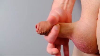 Guy Plays with Foreskin, Gets Erect in Close-up Masturbation