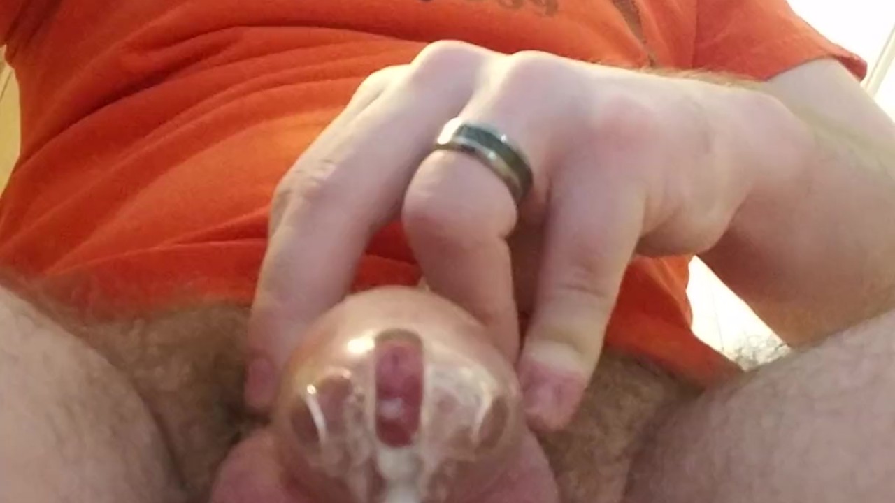 Dude Cums Through Chastity Cage