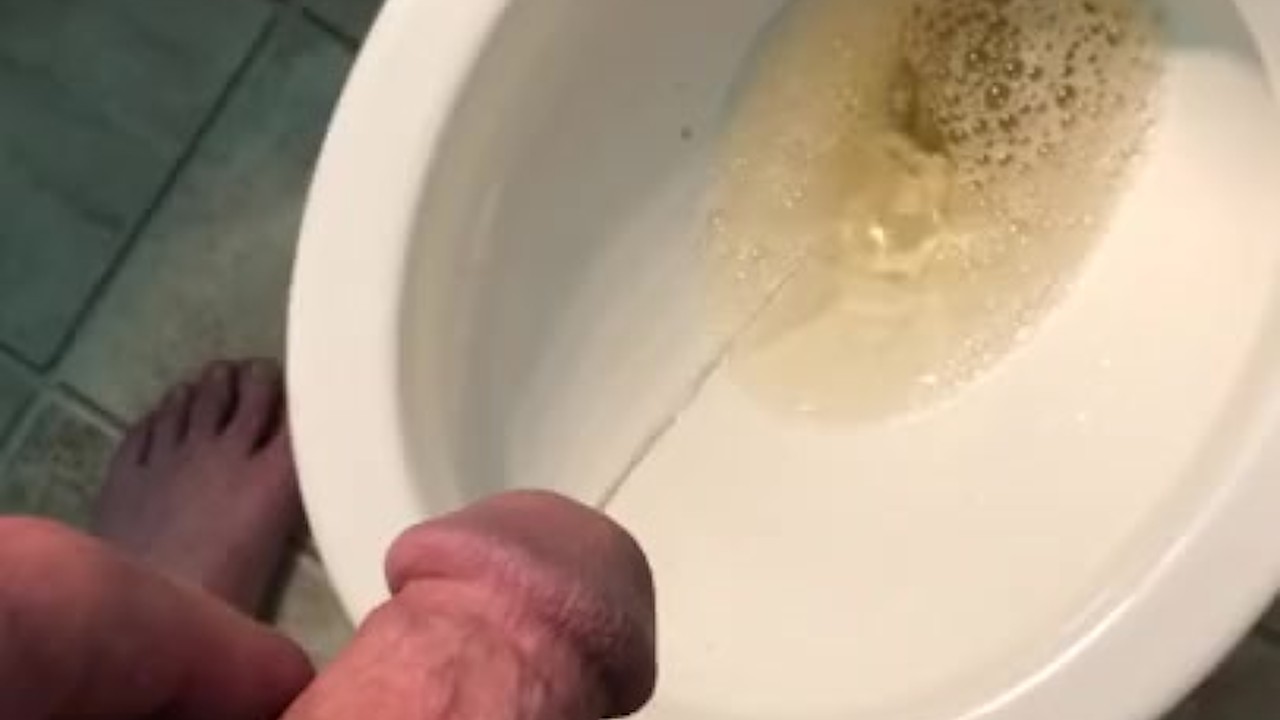 Guy Peeing in Toilet Caught on Camera