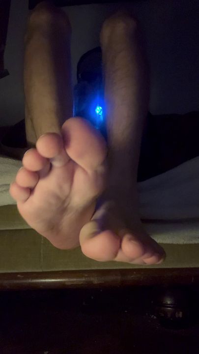 young twink taking off his socks