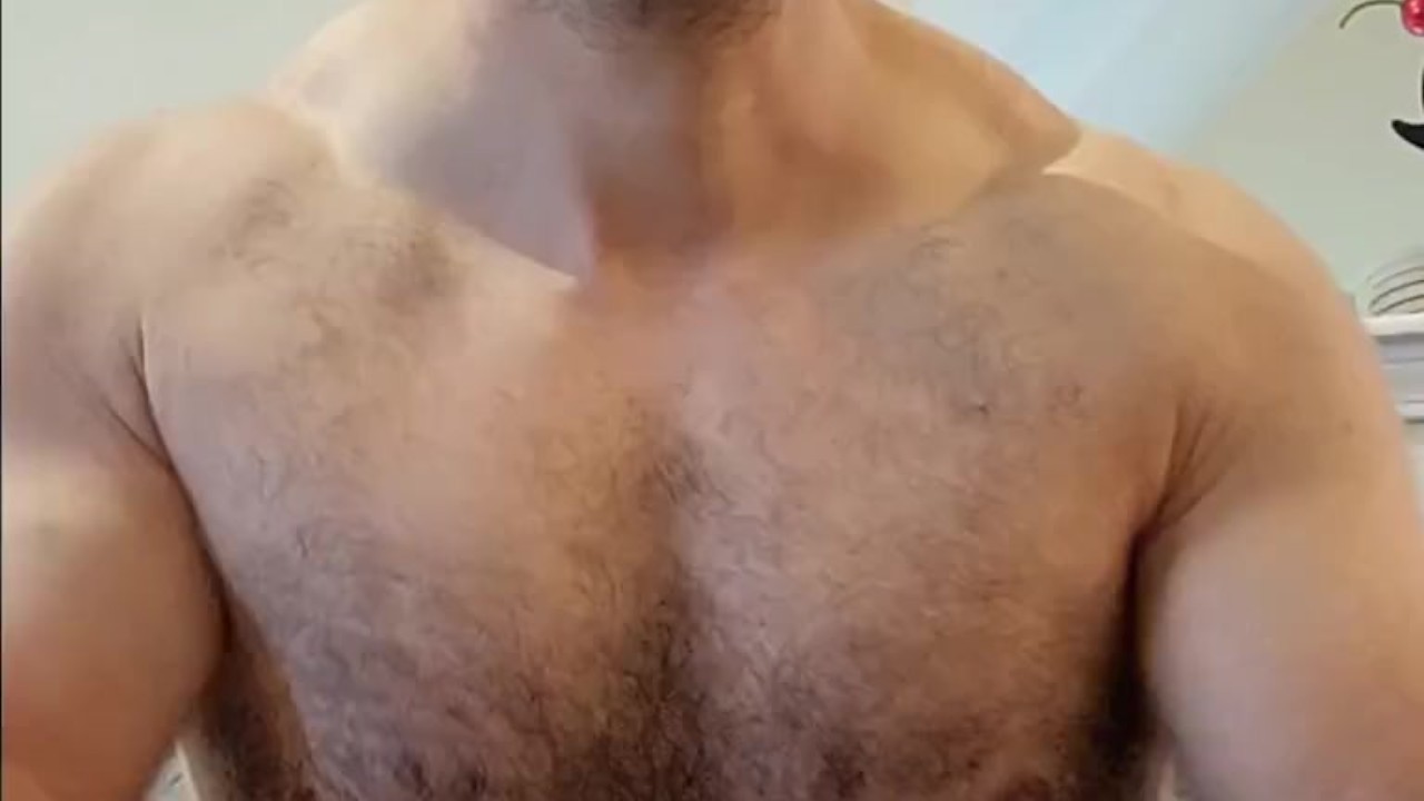 Muscle bear flexing and showing off armpits!